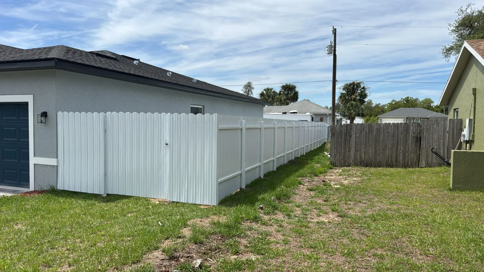 White Dura Fence backyard privacy install — Ocala FL